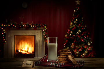close up view of glass of milk with cookies on color back