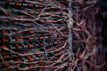 Messy telephone switchboard wire in box