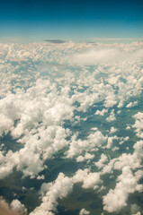 sky blue with cotton-shaped clouds seen from above