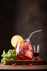 pomegranate juice cocktail and strong pomegranate liqueur