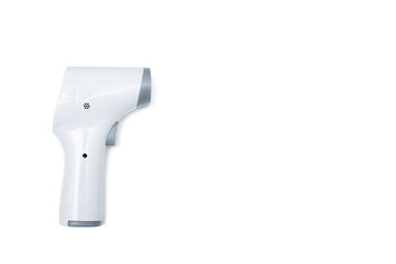 Temperature gun isolated on white background. Close up of laser thermometer with copy space for text.