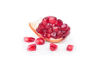 Closeup of pomegranate seeds on white background