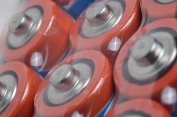 Electric batteries and accumulators of AAA AA standard size. close-up.