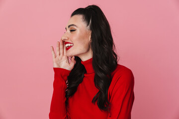 Happy beautiful girl smiling and screaming aside