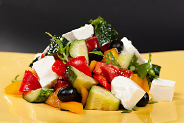 Greek salad with feta cheese and olives