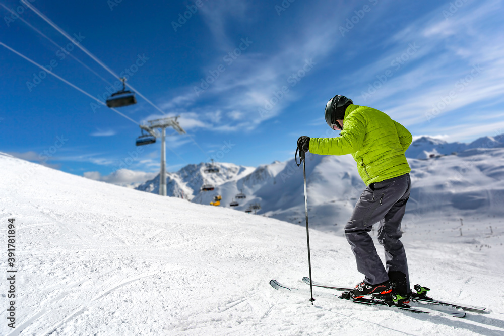 Wall mural skier and winter landscape