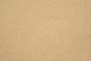 Texture of brown craft or kraft paper background, cardboard sheet, recycle paper, copy space for...