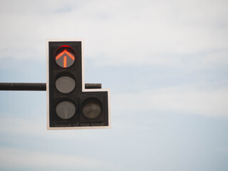 Traffic lights that are up, stop signs.