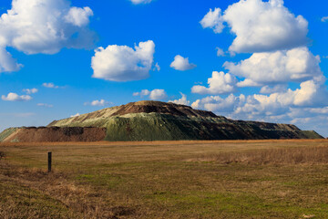 View of slag heaps of iron ore quarry. Mining industry