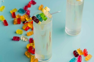 Cocktails. Traditional American drinks made by artisanal bartenders or mixologists in speakeasy & upscale bars or dives or taverns.Cocktails served in chilled cocktail glasses & garnished with fruit.