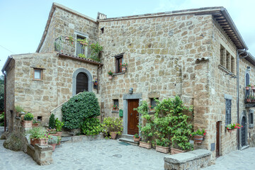 Fototapeta na wymiar old traditional house at historical village, Civita di Bagnoregio,, Viterbo, Italy