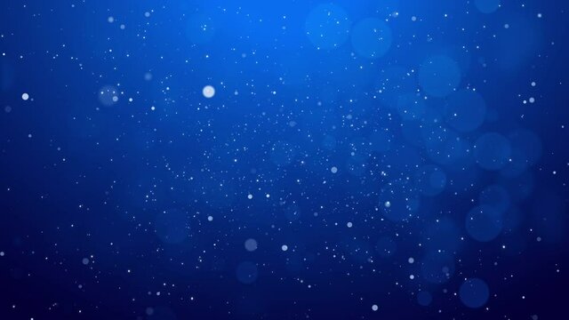 Blue bokeh particles glitter awards dust gradient abstract background. Futuristic glittering in space on blue background.	
