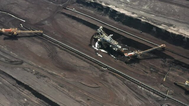 Rotation around of a mining quarry of coal or natural raw material. Bucket wheel excavator