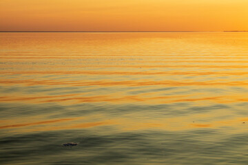 Fototapeta na wymiar Blick auf den Sonnenuntergang über dem Oder Haff