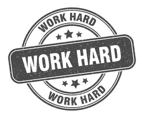work hard stamp. work hard label. round grunge sign