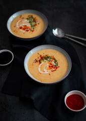Parsnip cream soup on dark background food photography