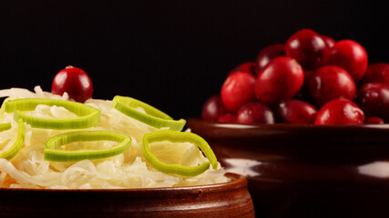 Sauerkraut with cranberries in a pot.
