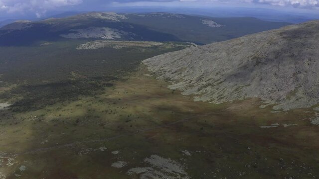 Aerial views of Mount Iremel and small Iremel in cloud, the Southern Urals