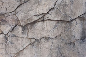 Obraz premium texture of street decorative plaster with cracks, warm shades