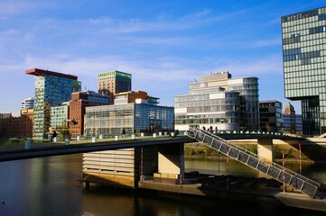 Dusseldorf (Medienhafen), Germany - November 7. 2020: View over river on buildings with modern futuristic architecture design