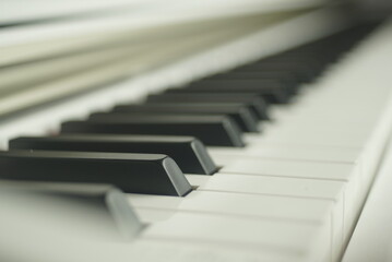 keyboard white piano close up