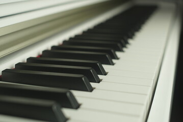 keyboard white piano close up
