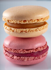 Two macarons with cream