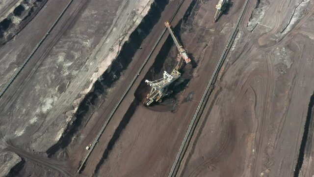 Rotation around of a mining quarry of coal or natural raw material. Bucket wheel excavator