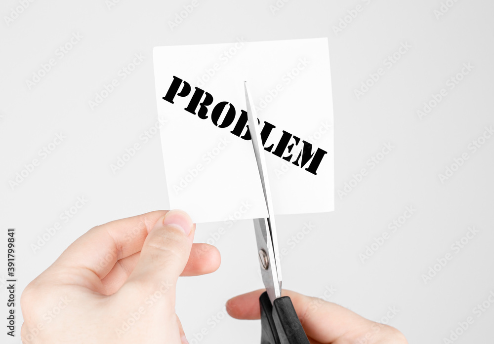 Poster man cuts scissors sticker with text problem