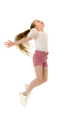 The little girl is jumping fun.The concept of a good mood, summer vacation.