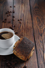 Bun with poppy seeds and coffee