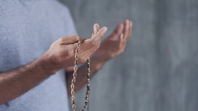 Young muslim man praying, Islamic ritual