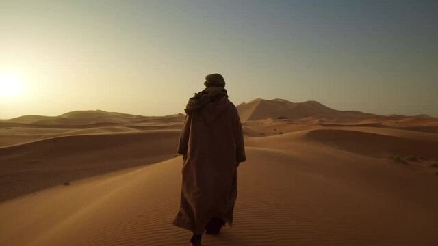 Man in the desert on the Sunset