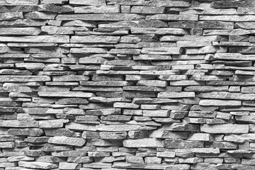 Stone gray wall as an abstract background.