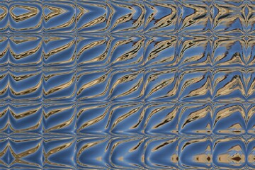 abstract water reflection patterns in shades of blue silver and gold