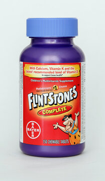 Bottle Of Flintstones Children's Vitamins Against White Background.