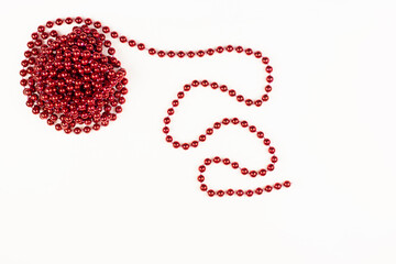 Christmas red decoration on a Christmas tree isolated on a white background.