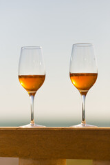 Beautiful scene with wine glasses standing alone