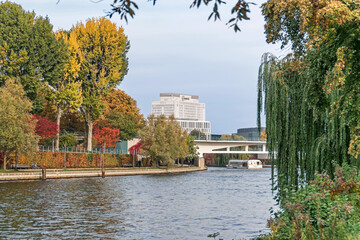  Banks of the river Spree  and the building of the Charite in Berlin, Germany © laranik
