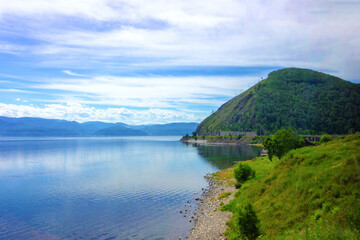 Fototapeta premium Coastline Baikal lake on the Circum-Baikal railway. Majestic summer landscape in the heart of Siberia, Russia