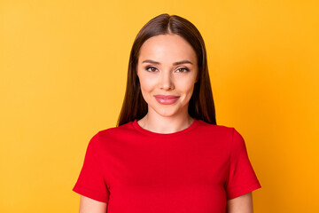 Fototapeta premium Headshot photo of attractive lady smiling wear casual red top standing isolated over yellow color background