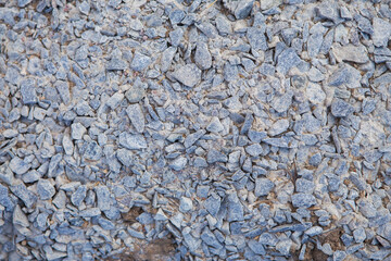Crushed stone background, gray stone texture.