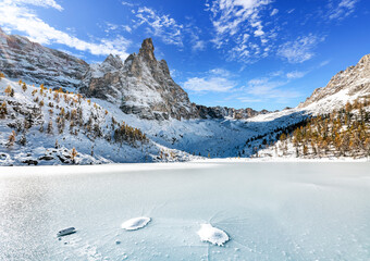 Beautiful winter day over frozen lake - lake Sorapis