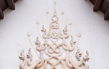 White dragon stucco in the traditional northern Thai style.