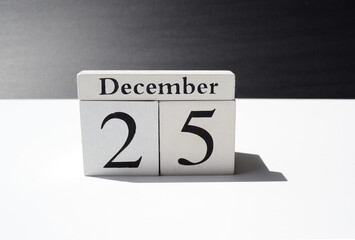 White cube number 25 and December with black and white background