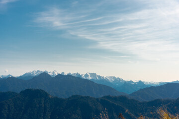 Fototapeta na wymiar The Alps view, blue mountains horizon.