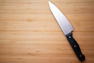 Knife on the background of the cutting board