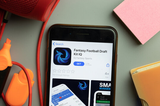 New York, United States - 7 November 2020: Phone Screen Close-up With Fantasy Football Draft Kit IQ Mobile App Logo On Display, Illustrative Editorial