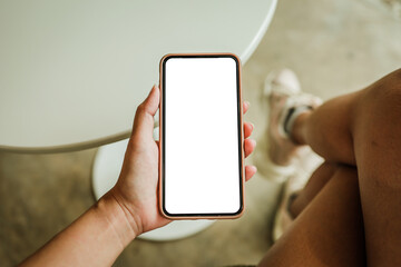 Women's hands holding cell telephone blank copy space screen. smart phone with technology concept