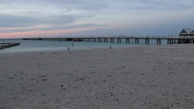 Australia Beach with Busselton Jetty Pier over Ocean Water. Panning